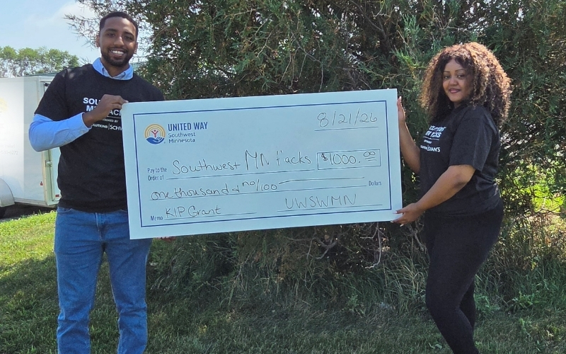 Southwest MN Hacks organizers with their big check for 1,000 KIP Grant