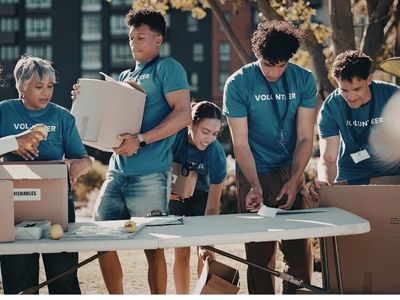 a group of volunteers organizing donations